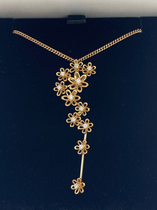 18ct rose gold flower diamond pendant