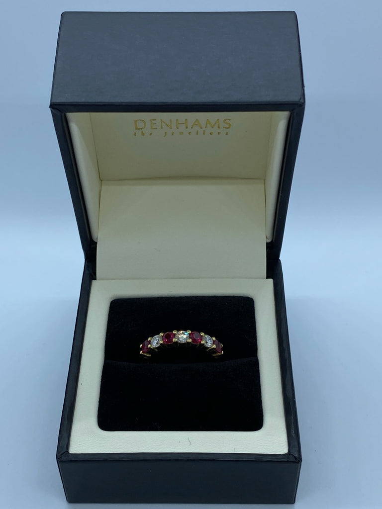Ruby and diamond eternity ring 18ct yellow gold