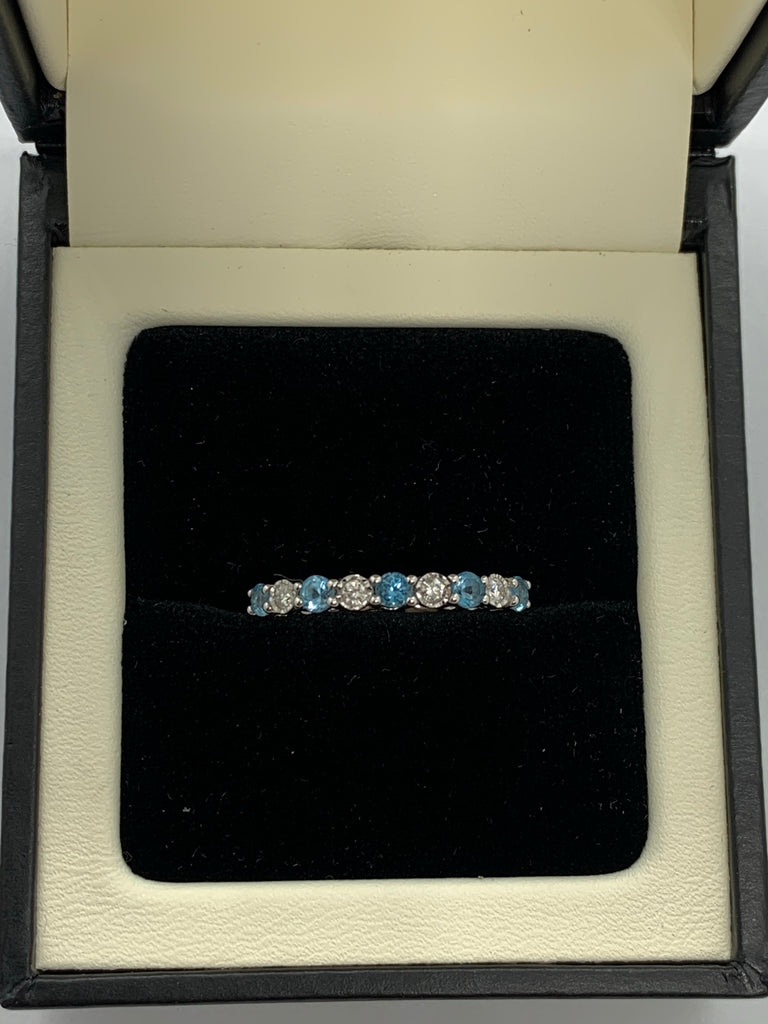 Blue Topaz and Diamond eternity ring