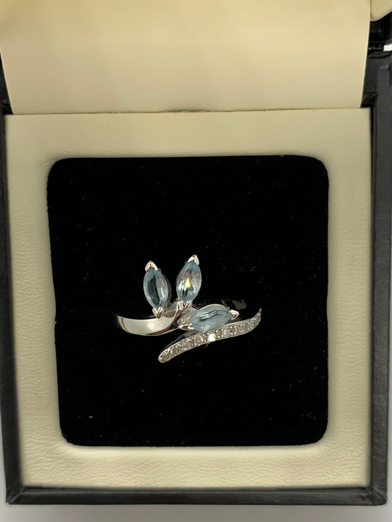 White gold Blue Topaz and Diamond dress ring