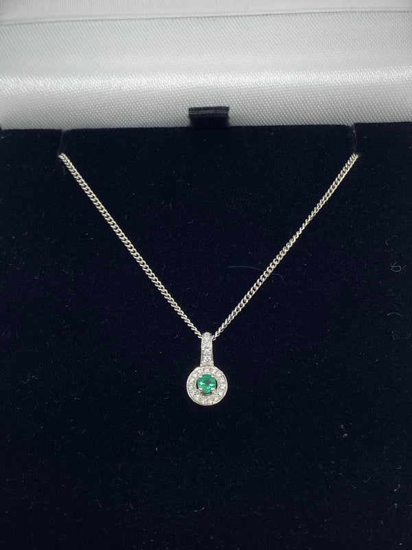 Emerald and diamond cluster pendant 18ct white gold