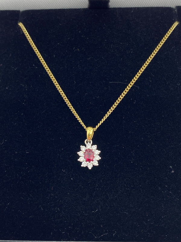Ruby and diamond cluster pendant 18ct yellow gold