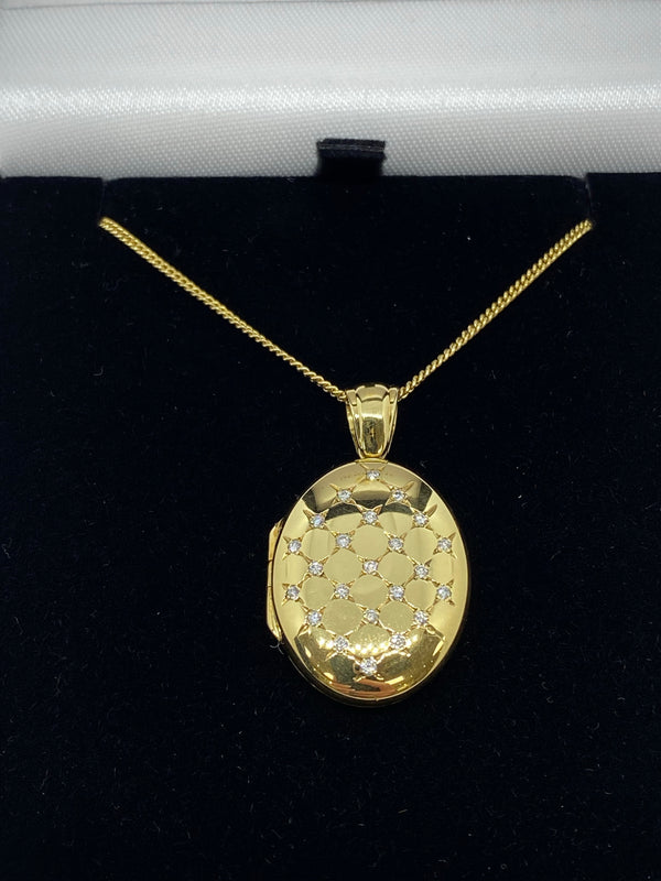 18ct yellow gold diamond set locket and chain